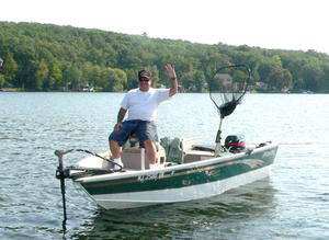 Mike Melfa with one of his many boats