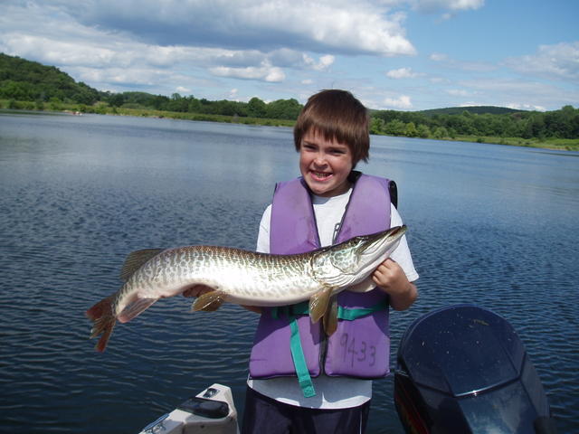 Ryan Young with a summer time tiger musky