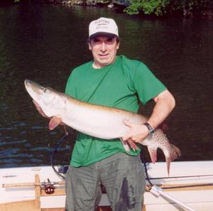 Longtime member Bill Kunecz with his personal best- a 52 Muskie caught and released May 2004.