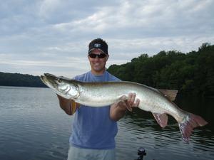 Steves freind Brian Honan with his first musky a 44" from Echo Lake